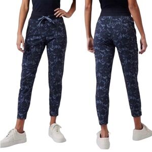 Athleta Trekkie North Jogger floral pants with side zip pockets  Size 4